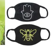  ??  ?? Pack of 2 Face Covers: Hand of Fatima & Bee Dh40