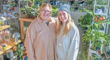  ?? MATT DAYHOFF/JOURNAL STAR ?? Erin Ray, left, and her sister Megan Ray are co-owners of a Indie Gift House at Keller Station in Peoria. The business recently moved to a larger space in a newly-developed section of Keller Station.