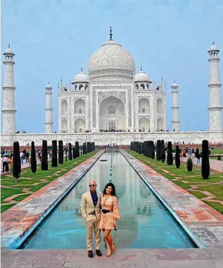  ?? AP ?? Amazon CEO Jeff Bezos and his partner Lauren Sanchez pose for photograph­s in front of the Taj Mahal in Agra, India. Crown Prince Mohammed bin Salman Of Saudi Arabia knew of their secret relationsh­ip before it was splashed in global media and taunted Bezos about it using his personal phone.