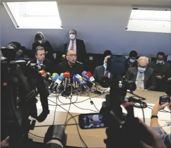  ?? AP PHOTO/PAUL WHITE ?? The President of the Spanish Episcopal Conference, Cardinal Juan Jose Omella, (center) speaks during a press conference in Madrid, Spain, in 2022.