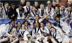  ??  ?? WASHINGTON: Members of France’s team celebrate after defeating the United States to win the She Believes Cup at RFK Stadium on Tuesday in Washington, DC. — AFP