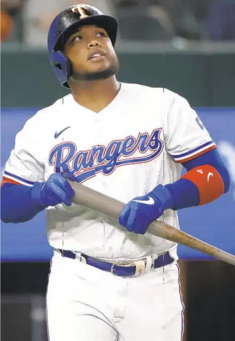  ?? GETTY ?? Pitches busted Willie Calhoun’s jaw and forearm, but he’s not going to back off at plate with Yankee job on the line.