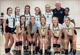  ?? TIM GODBEE / For the Calhoun Times ?? Calhoun players and head coach Randy Rice pose for a team photo after their second-round win over Pike County.