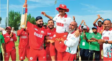  ??  ?? A file photo of Oman cricketers lifting senior OC board member Pankaj Khimji after a win in the ICC World Cricket League Three at Al Amerat