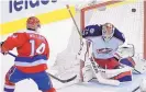  ?? NICK WASS/ASSOCIATED PRESS ?? Washington’s Justin Williams (14) scores a goal in front of Columbus goalie Sergei Bobrovsky Thursday.