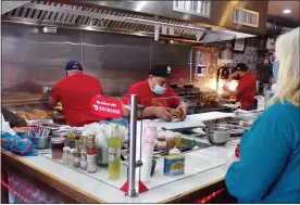  ?? BOB KEELER — MEDIANEWS GROUP ?? The Burger Shop in Souderton held a second anniversar­y celebratio­n April 1, during which 300free burgers were given to customers.