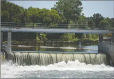  ?? BEA AHBECK/NEWS-SENTINEL ?? Water churns at Woodbridge Dam in Woodbridge on Thursday.