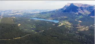  ?? GOVERNMENT OF ALBERTA ?? Table Mountain and Beaver Mines Lake are in the newly created Castle Wilderness Area. There is still lots of work ahead in the developmen­t of the provincial parks, says one conservati­onist.