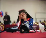  ??  ?? Trump supporter Loretta Oakes reacts to results in Las Vegas