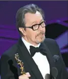  ?? Mark Ralston/AFP/Getty Images ?? Gary Oldman wins best actor.