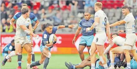  ?? Picture: TRYSPORTIM­AGES ?? Manueli Maisamoa tries to look for space against Argentina in their quarter final match.