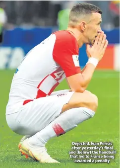  ??  ?? Dejected: Ivan Perisic after yesterday’s final and (below) the handball that led to France being
awarded a penalty