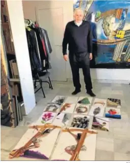  ?? H.I. ?? Juan Carlos Castro en su estudio con las obras que ilustran el pregón.