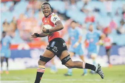  ?? Picture: Gallo Images ?? NO CATCHING HIM. Lions No 8 Hacjivah Dayimani runs in for his first try during their Currie Cup match against the Blue Bulls at Loftus Versfeld on Saturday.