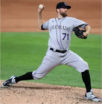  ?? Tom Pennington, Getty Images ?? Rockies closer Wade Davis was 2-for-2 in save attempts last weekend in Texas, despite a few hiccups.
