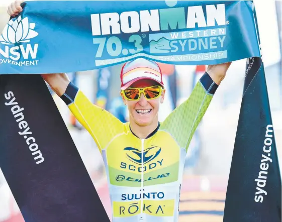  ??  ?? Melissa Hauschildt overcame multiple surgeries to find the form that saw her win the 70.3 ironman at Penrith yesterday.