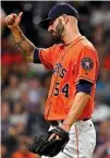  ?? Associated Press ?? Houston Astros starting pitcher Mike Fiers acknowledg­es the crowd while walking to the dugout after being pulled against the Tampa Bay Rays on Friday in Houston.