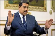  ?? AP/ARIANA CUBILLOS ?? “If he wants to meet, just tell me when, where and how, and I’ll be there,” Venezuelan President Nicolas Maduro said of U.S. special envoy Elliott Abrams.