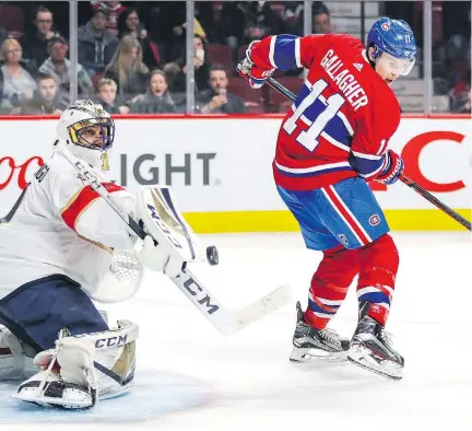  ?? JOHN MAHONEY ?? Panthers goalie Roberto Luongo makes a blocker save as Canadiens forward Brendan Gallagher searches for the puck during the third period on Monday night. Luongo made 28 saves for his third shutout of the season, while the Habs have now been shut out a team-record 12 times.