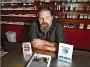  ?? FRED SQUILLANTE / COLUMBUS DISPATCH ?? James Jarvis, owner of several vape shops in Ohio, said the owners of such stores will either have to absorb the state’s new e-cigarette tax or pass the cost on to their customers.