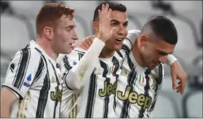  ?? (AFP) ?? Juventus’ Portuguese forward Cristiano Ronaldo (centre) celebrates after scoring his second goal during the Italian Serie A match against Crotone at the Juventus stadium in Turin on Monday.