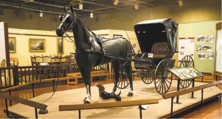  ??  ?? A buggy owned by Julia Weber is on display at the museum. The Weber family’s cottage is part of the museum and the family’s artifacts are displayed in several exhibits recreating rooms from the home.