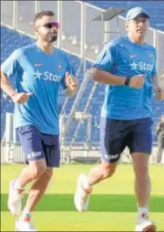  ?? PHOTO: HT PHOTO ?? Cricketers Virat Kohli and Mahinder Singh Dhoni are considered the fastest runners between the wickets; (below)Hockey player Sardar Singh, who scored an impressive 21:4 in the YoYo test