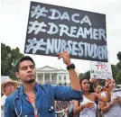  ?? JACQUELYN MARTIN/AP ?? Immigratio­n supporters rally outside the White House in September.