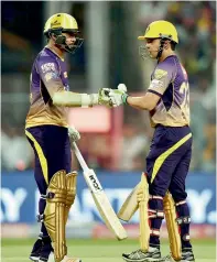  ?? PTI ?? KKR’s Gautam Gambhir (right) and Sunil Narine. —