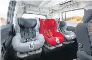  ??  ?? A trio of baby seats fitted at the rear of the Opel Combo Life demonstrat­e the exemplary space available..