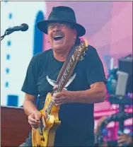  ?? NANCY KASZERMAN/ZUMA PRESS WIRE/TNS ?? Carlos Santana performs during the 2021 “We Love NYC: The Homecoming Concert” in Central Park in New York.