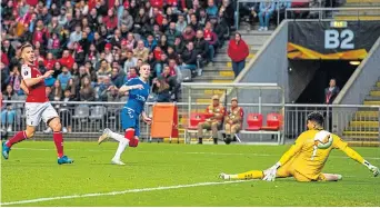  ??  ?? Ryan Kent scores Rangers’ Europa League winner in Braga back in February