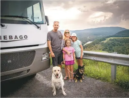  ?? JOEL SHILLIDAY ?? Joel Shilliday, 45, his wife Elizabeth, 41, and daughters Addie, 11, and Amelia, 8, decided to sell their Eastern Shore home and travel full time in a 31-foot 2014 Winnebago RV.