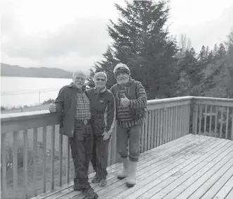  ??  ?? Three committee members of Operation Refugees Haida Gwaii — from left, Bruce Ives, Fran Fowler and Carl Coffey — stand on the deck of a four-bedroom house that’s set up for a Syrian family of up to eight people. Just one problem: So far, there are no takers.