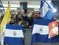  ?? (AP/Jose Luis Magana) ?? Supporters of Nicaraguan political prisoners chant Thursday at Washington Dulles Internatio­nal Airport, in Chantilly, Va.
