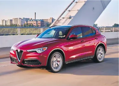  ??  ?? 2018 Alfa Romeo Stelvio Ti Sport features luxury touches such as genuine oak interior trim, 19-inch wheels, 12-way powered heated front sport seats and aluminum paddle shifters and sport pedals.