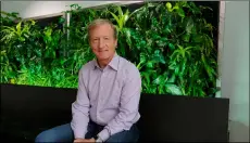  ??  ?? In this photo taken June 27, environmen­tal activist & billionair­e Tom Steyer poses at his offices in San Francisco.