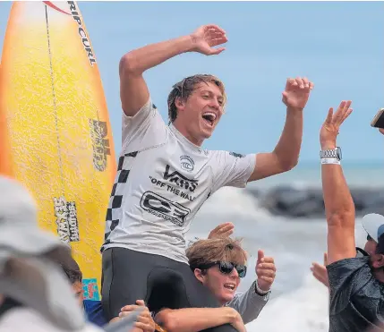  ?? RUSSELL TRACY/FREELANCE ?? Luke Gordon, a 19-year-old from Folly Island, S.C., celebrates after winning the Vans Pro final Sunday at the Virginia Beach Oceanfront. He scored a 9.27 on his final wave, good for a 17.60 aggregate. Virginia Beach’s Michael Dunphy, the 2014 champ, placed second with a 14.97.