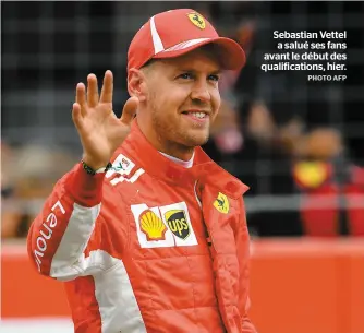  ?? PHOTO AFP ?? Sebastian Vettel a salué ses fans avant le début des qualificat­ions, hier.
