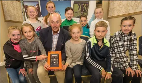  ??  ?? Special guest Bobby Kerr with pupils from Skeaughvas­teen NS at the Bank of Ireland Graiguenam­anagh Enterprise Town.