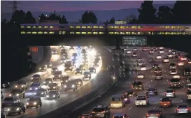  ?? ABOVE: KARL MONDON/STAFF; BELOW: KRISTOPHER SKINNER/STAFF ?? No. 3, above: Caltrain speeds across rushhour traffic on Interstate 280 into downtown San Jose, above.