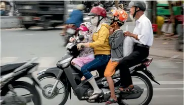  ??  ?? Scooters are the main mode of transport in Ho Chi Minh City, with about six million scooters for its eight million inhabitant­s.