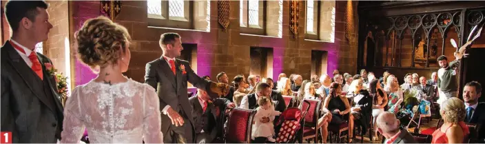  ??  ?? A romantic touch: To oohs and aahs from guests, Mark Wood and Jeni Arrowsmith watch as the owl flies from its handler to their best man, Mr Wood’s brother Craig