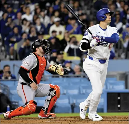  ?? KEITH BIRMINGHAM — STAFF PHOTOGRAPH­ER ?? The Dodgers’ Shohei Ohtani watches his 430-foot home run, his first of the season, during Thursday’s 5-4win over the visiting Giants.