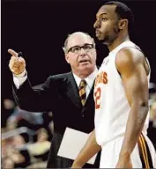  ?? Gina Ferazzilos Angeles Times ?? KEVIN O’NEILL, talking to Byron Wesley during a game last month, had a 48-65 record at USC.
