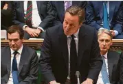  ?? Parliament­ary Recording Unit via Associated Press ?? Britain Prime Minister David Cameron on Monday told the House of Commons that now is not the time to begin talks to extricate Britain from the EU.