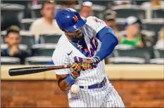  ?? Frank Franklin II / Associated Press ?? The Mets' Starling Marte is hit by a pitch during the sixth inning against Milwaukee. He left with a forearm bruise.