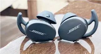  ?? DAVID CARNOY/CNET ?? Bose’s Sport Earbuds are more compact and lighter and also more affordable than the brand’s QuietComfo­rt Earbuds.