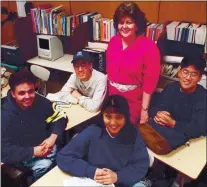  ?? FILE PHOTO ?? Lynbrook High School journalism teacher Arnetta Garcin, standing, is shown with some of her students in this file photo. Garcin, who died in 2002, has a scholarshi­p named after her by the Journalism Education Associatio­n of