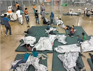  ?? U.S. CUSTOMS AND BORDER PATROL ?? A photo released Monday shows children in the Border Patrol processing center in McAllen, Texas. Critics of the family-separation policy include former first lady Laura Bush, who called it “cruel” and “immoral.”